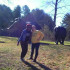 Keisha Butler and Caroline Dugan, '15, hang with elephants while on a field trip to the Asheboro Zoo.