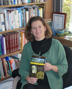 Dr. Indira Gesink of BWs History Department with her new book about BWs founder, John Baldwin.  