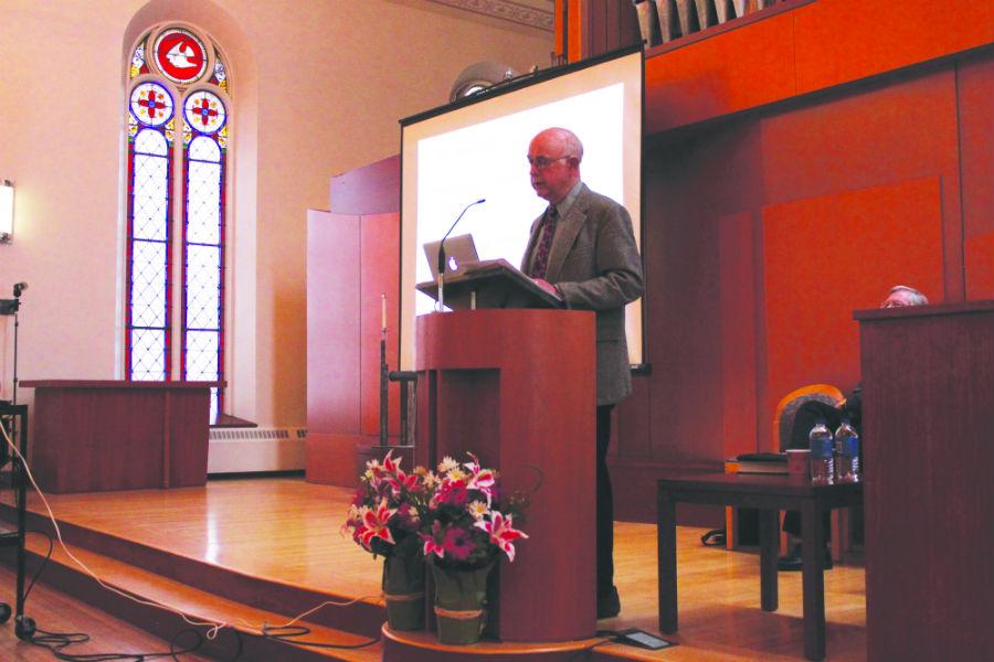 Dr. Paul F. Knitter speaking in the Lindsay - Crossman Chapel.