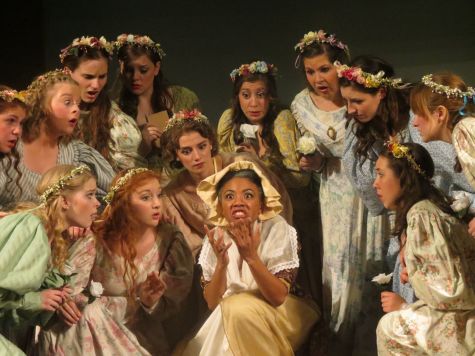 The Women’s Chorus of the Maybud cast of Ruddigore surround Erica Moffatte, 
playing the role of Dame Hannah. 

