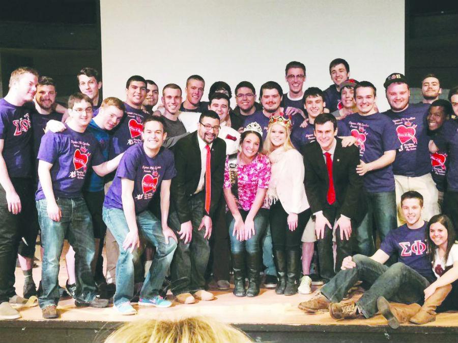Brothers of Sigma Phi Epsilon fraternity with Queen of Hearts winner, Alison Fiorucci.
