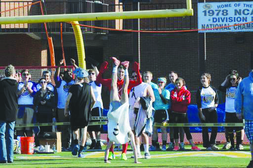 Students goofing around on the Tressle Stadium during Friday’s obstacle tournament.  Photo credit: University Relations 