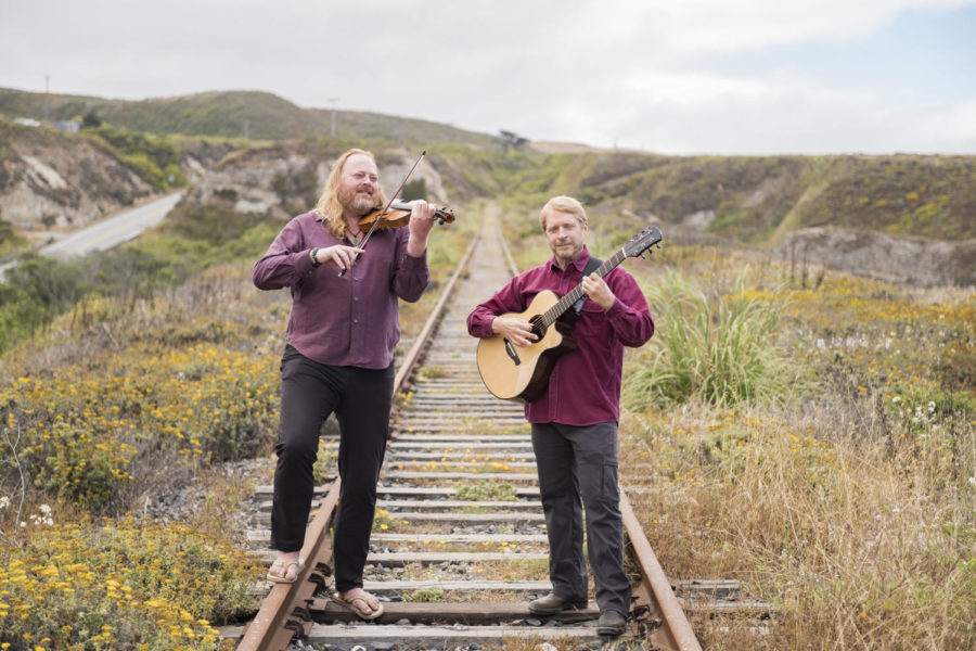 Pictured left to right: Fire & Grace’s violinist Edwin Huizinga and guitarist William Coulter.