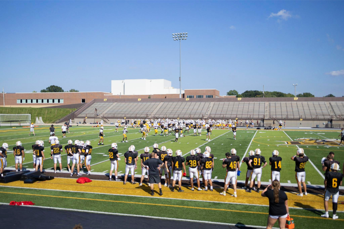 The football team practicing for their first game of the season this upcoming Saturday at George Finnie Stadium against Mount St. Joseph University.