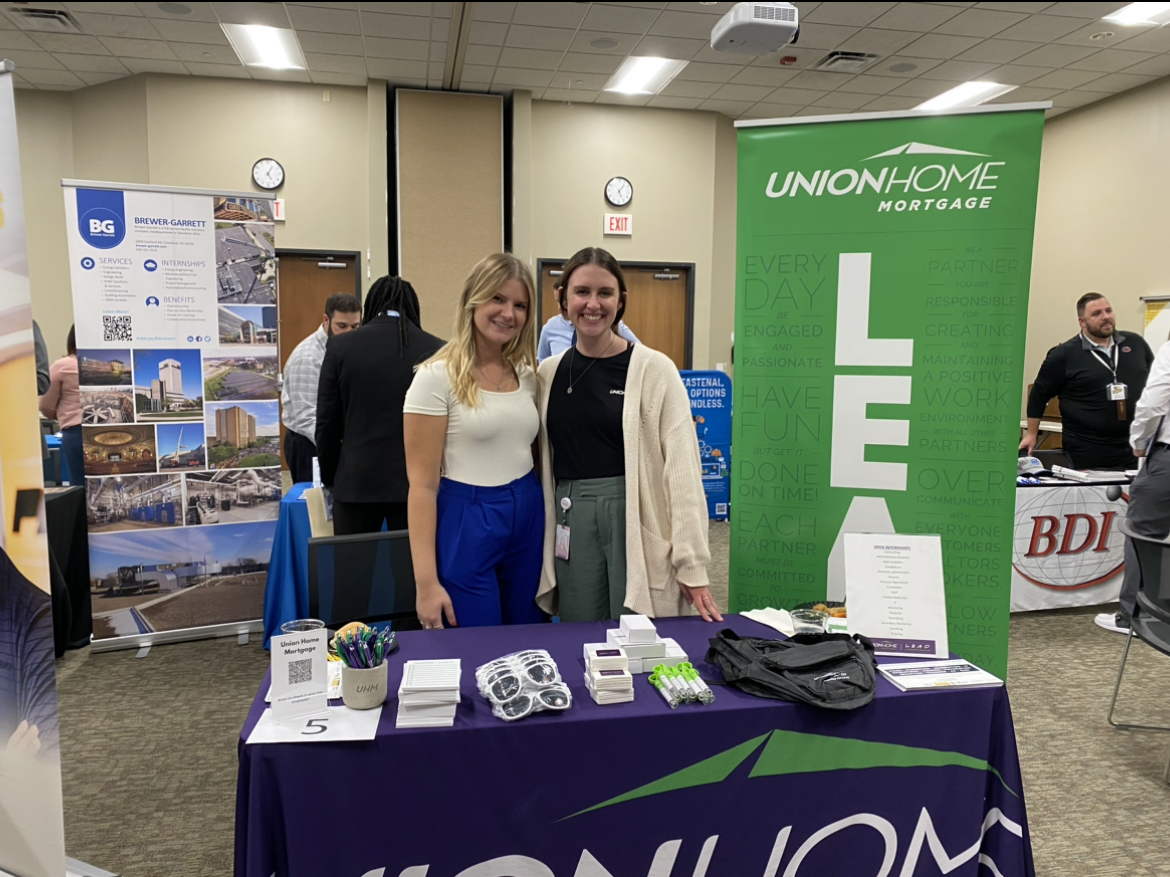 Shannon Hassel (left) a Recruiting Intern and Paige Shultz (right) a Campus Recruiter representing Union Home Mortgage at the Business Career Fair. 