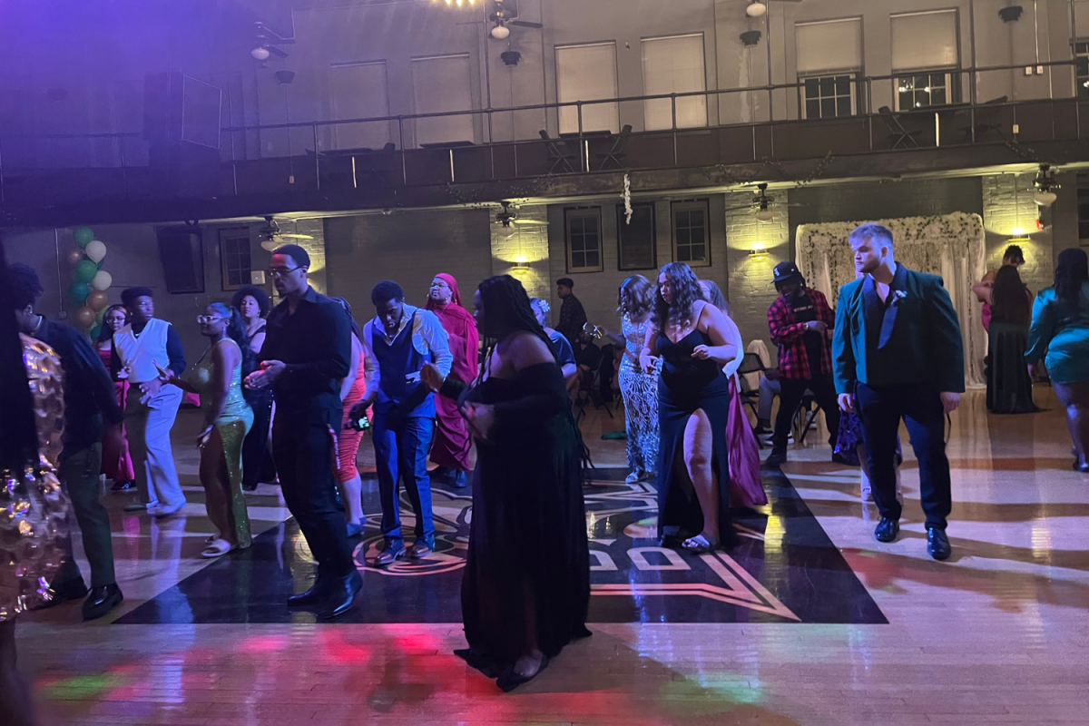 Students dance at the annual Black Student Alliance ball in the Student Activity Center on April 22. 