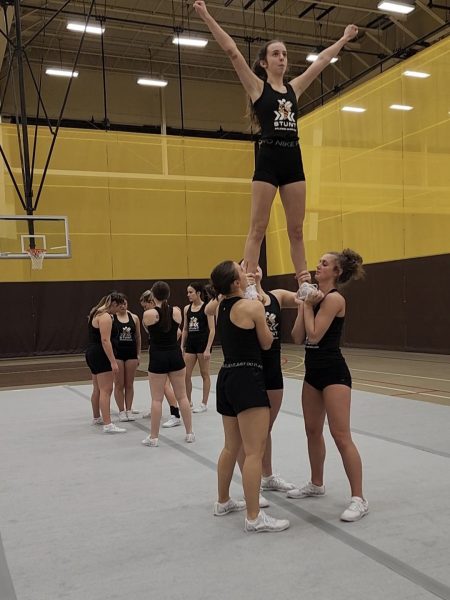 The BW STUNT team practices for the upcoming competition season.