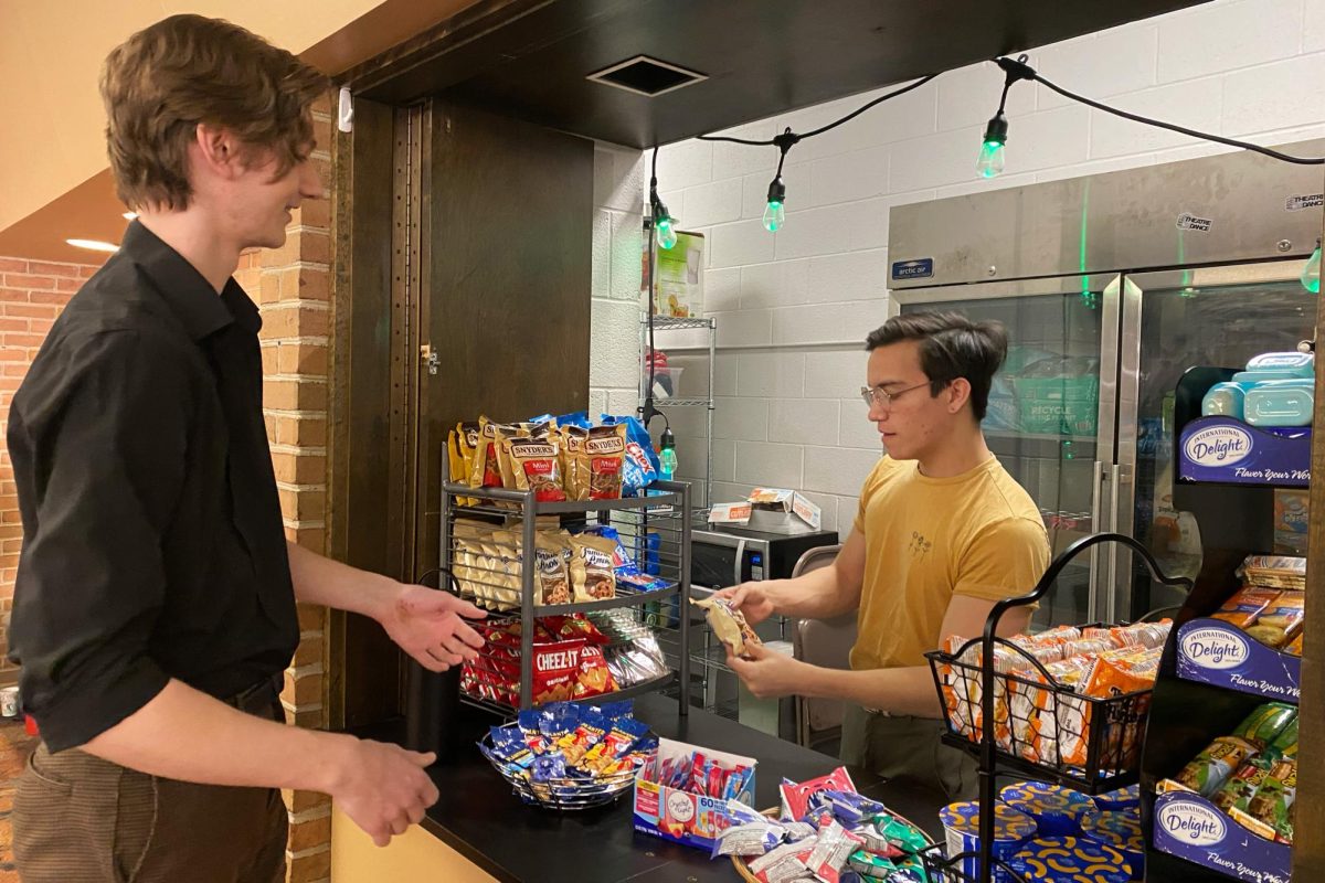 Student purchases snacks from the Groundlings Café before its recent closure.