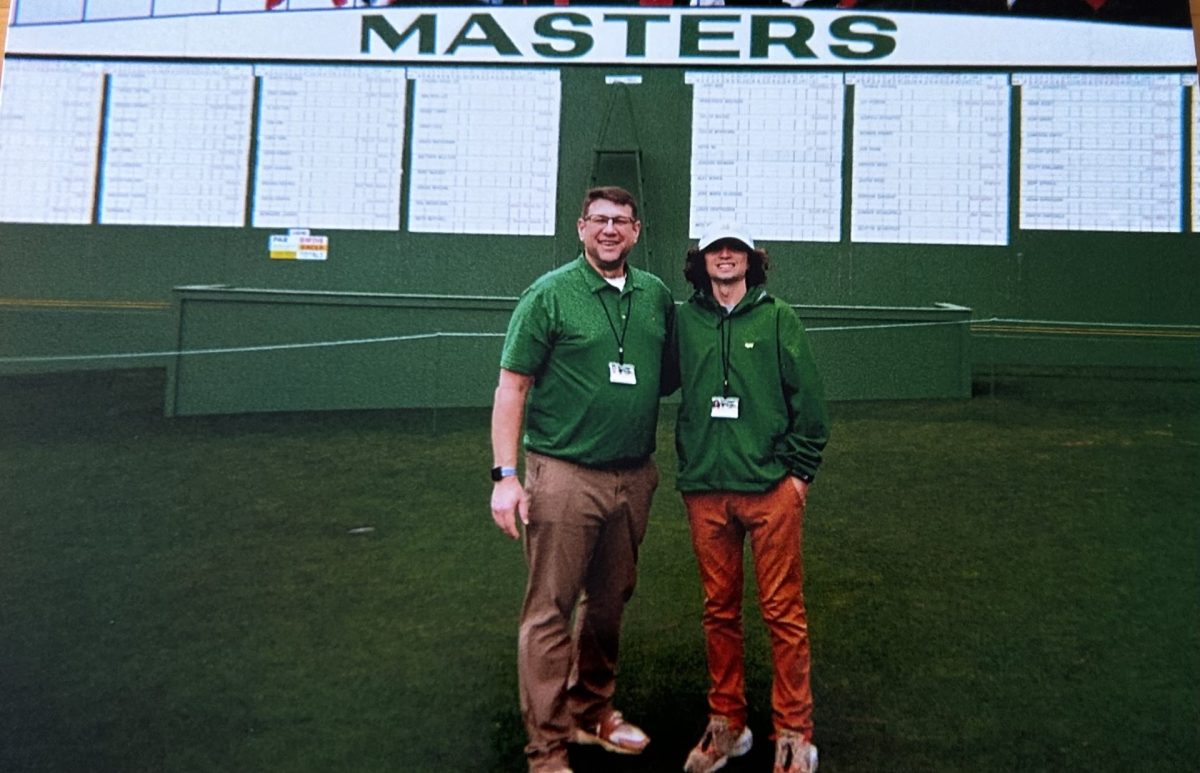Left to right: David Lamb and Anthony Dick at last years Masters Golf Tournament. 