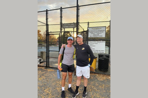 Brian Rector and Will Horvath standing outside of the BW tennis courts.