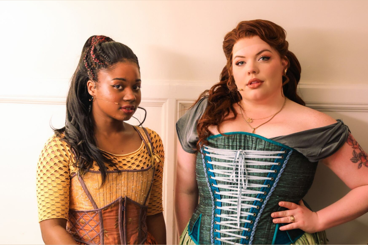 Camille Brooks (left) and Shelby Griswold (right) backstage at Playhouse Square in their ensemble costumes. 