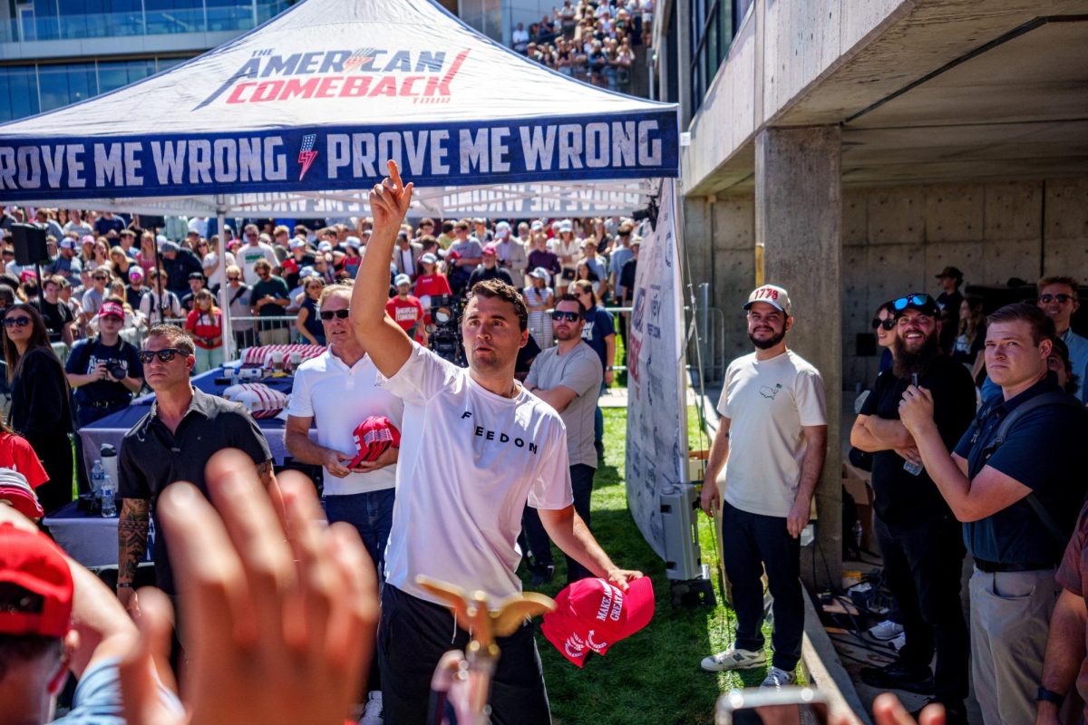 Conservative activist and commentator Charlie Kirk throws hats to the crowd shortly before he was shot at a Utah Valley University speaking event in Orem, Utah, U.S. September 10, 2025. Trent Nelson/The Salt Lake Tribune via REUTERS.