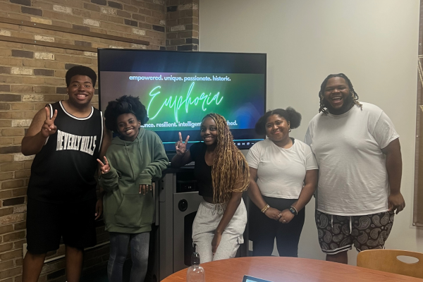 Members of Euphoria posing together.