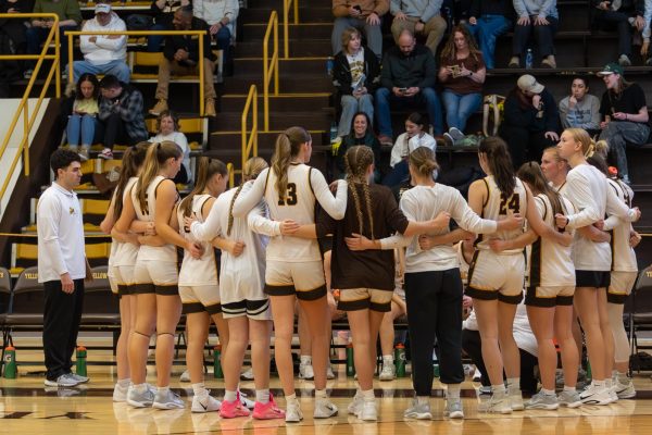 The BW women’s basketball team huddles in a timeout during a game against Muskingum. Credit: Josh Minier
