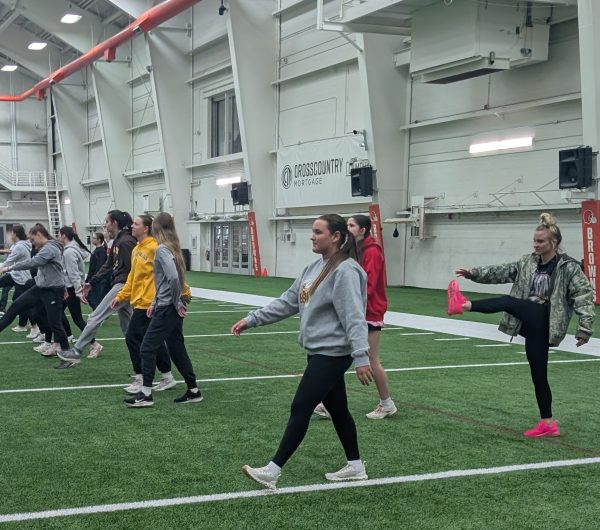 A group of interested students participate in a skills event held at the Cleveland Browns’ training facility on April 7.